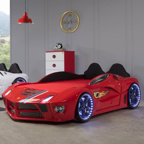 Vibrant red twin race car bed with a sleek design and exciting details - perfect for little speedsters and adventure seekers.